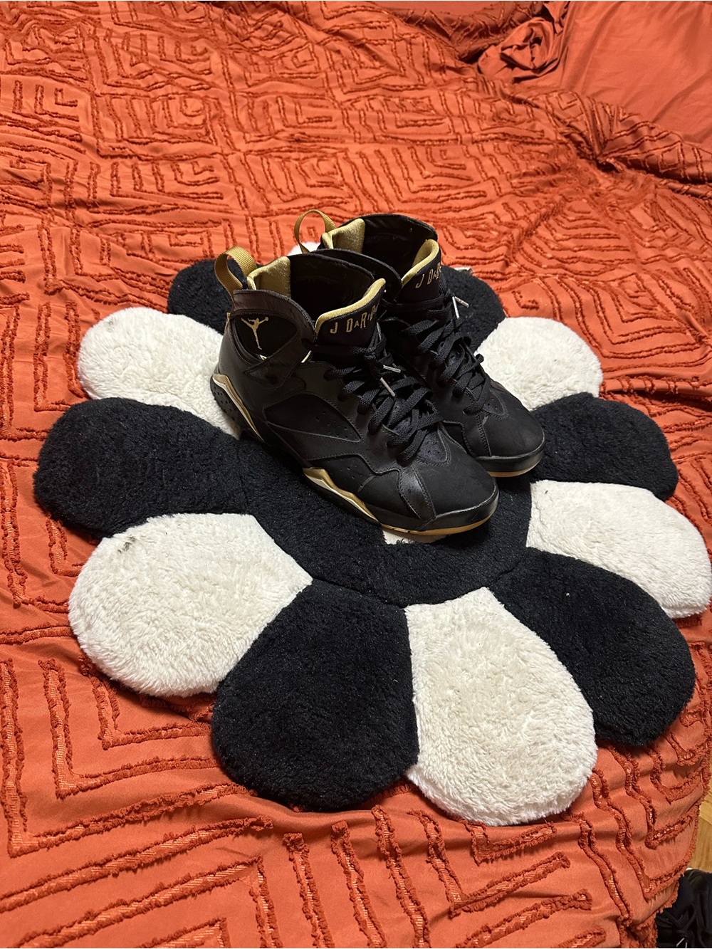 Jordan men’s Black and Gold High-Top Sneakers